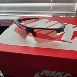 Oakley Black Sunglasses with Pink Lenses
